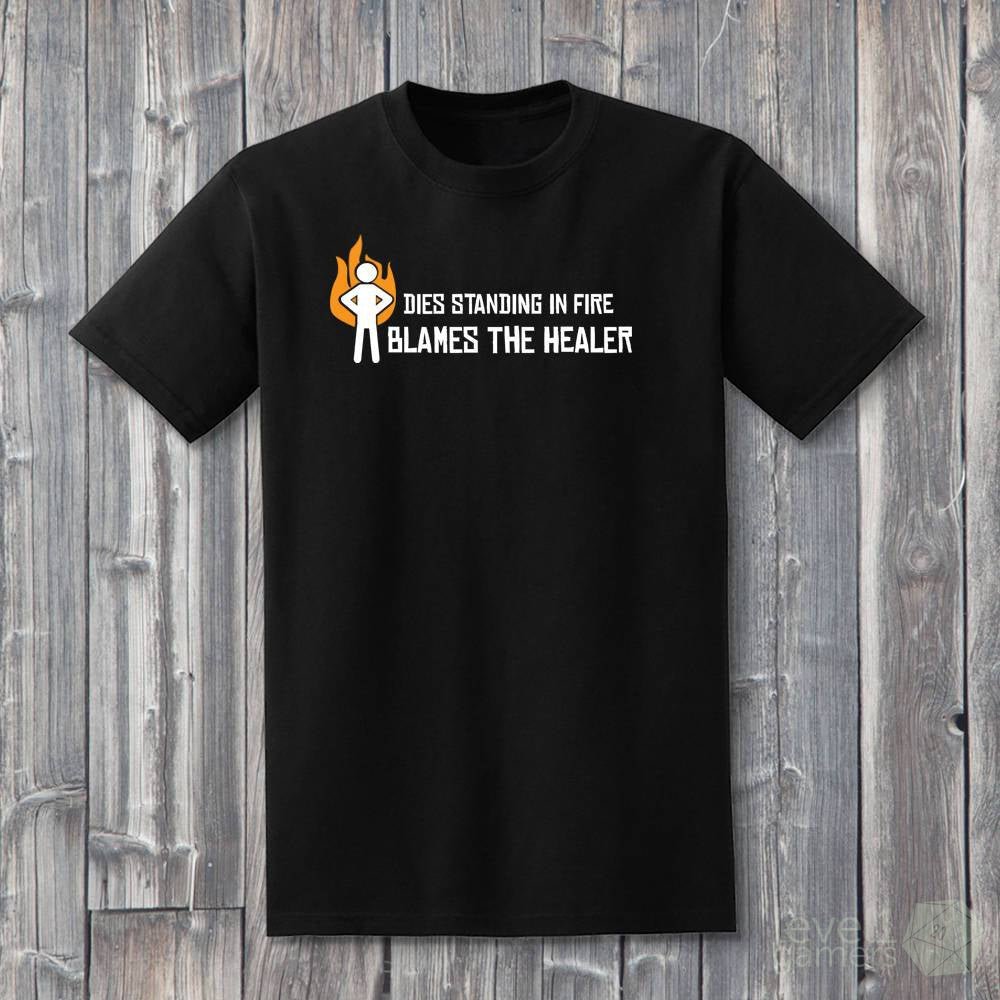 Dies Standing In Fire Blames The Healer T-Shirt  Level 1 Gamers   